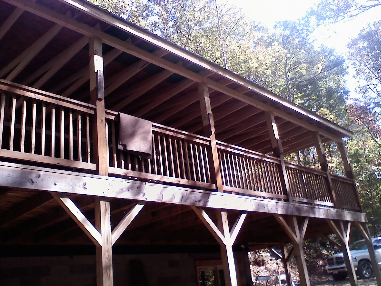 Timber framing under a new elevated porch and deck — Roof Leak Repair in Copeland by Roofing Brothers